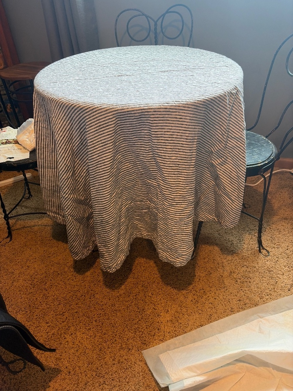 55 in by 55 inch round table cloth. Very chic and 100 percent llinen